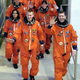 The space shuttle Columbia crew departs their quarters for the launch at the Kennedy Space Center in Cape Canaveral, Florida January 16, 2003. Clockwise from lower left are Pilot Wille McCool, Kalpana Chawla, who was raised in India, Ilan Ramon, the first Israeli to travel on the space shuttle, Michael Anderson, David Brown, Laurel Clark and Mission Commander Rick Husband in lower right. The shuttle is beginning a 16-day scientific research mission.